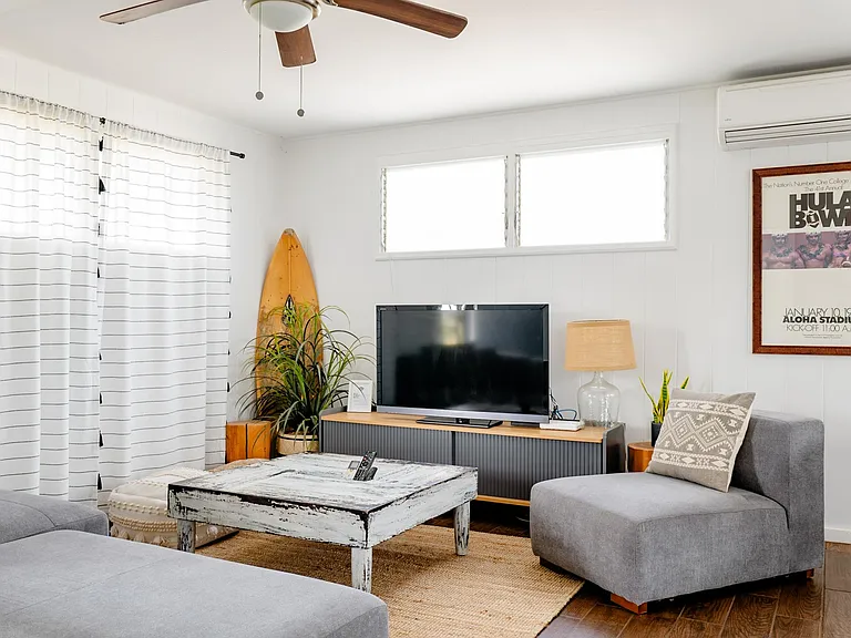 Gather around your cozy living room equipped with high powered air conditioning.