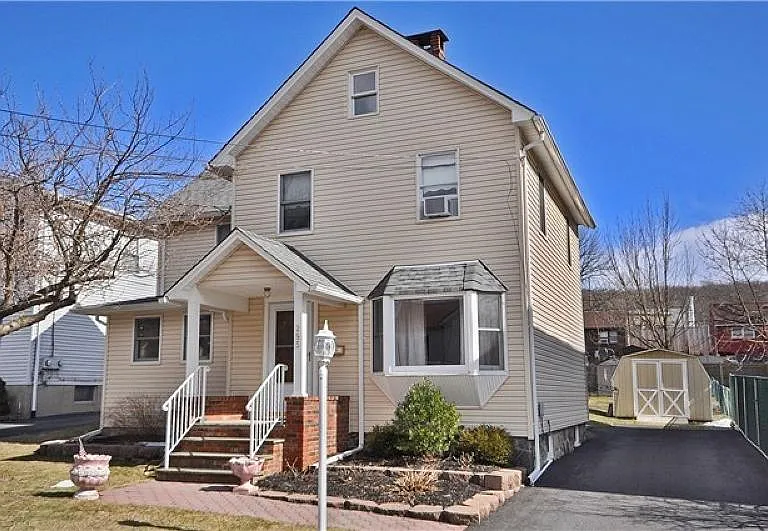 Front with Large Driveway
