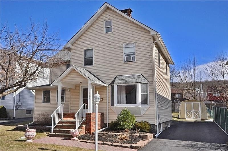 Front with Large Driveway
