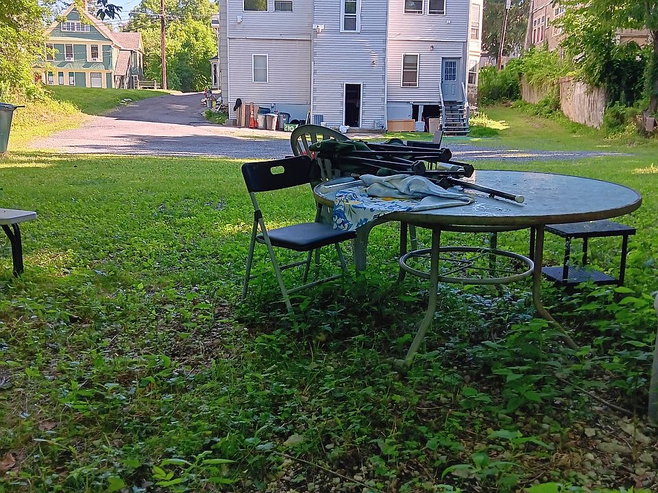 Backyard with large parking lot