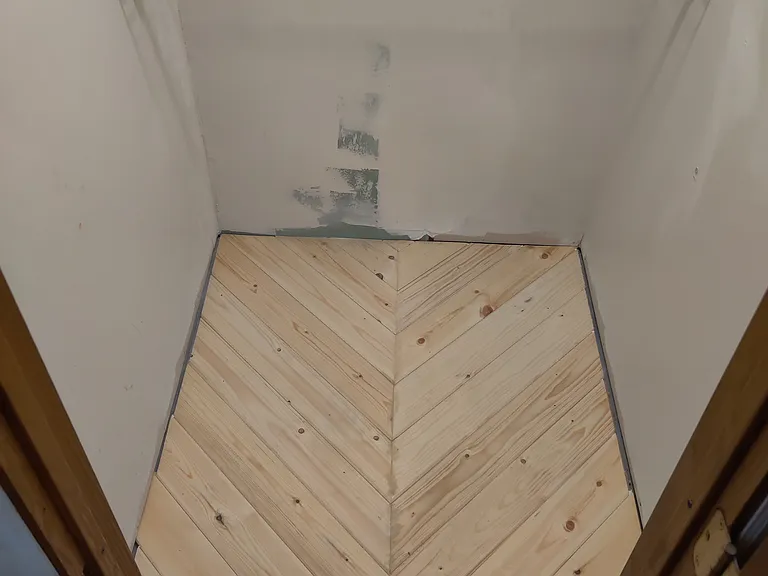 1 of 2 walk in closets for master bedroom.
