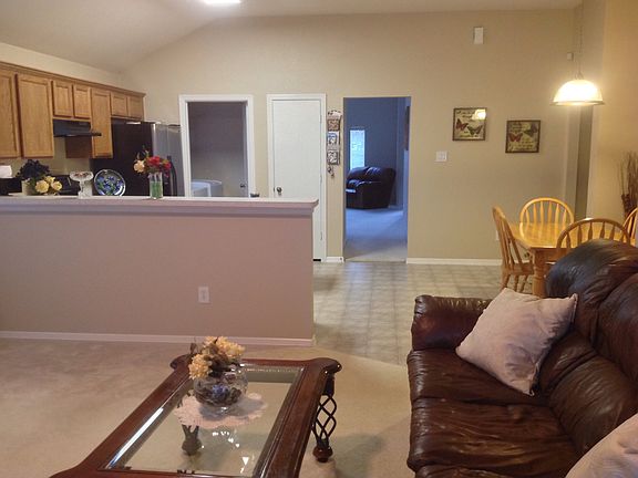 View of kitchen from den
