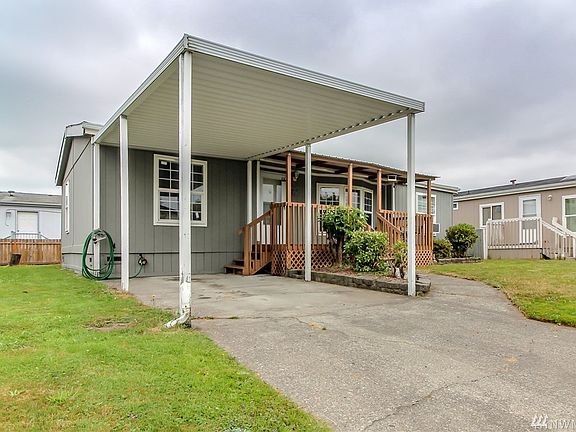 Nice side yards on both sides lead to a private backyard.