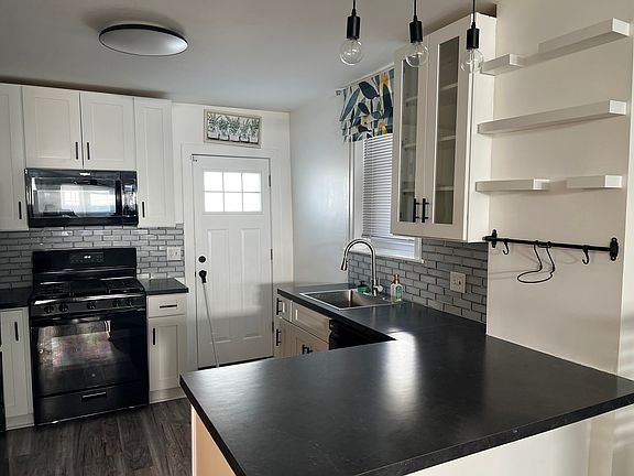 Beautiful Kitchen with glass back splash