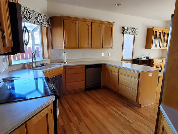 2nd image of 7400 261st St NW Unit A