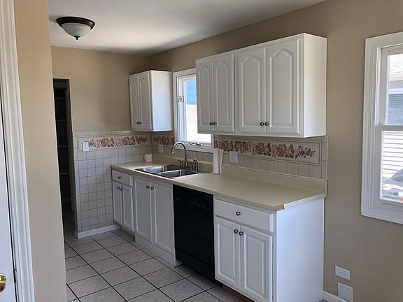 Kitchen with redone cabinets and hardware