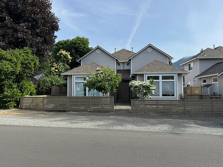Nice Street Appeal and you can park one more car in addition to the fenced in detached 2 car garage