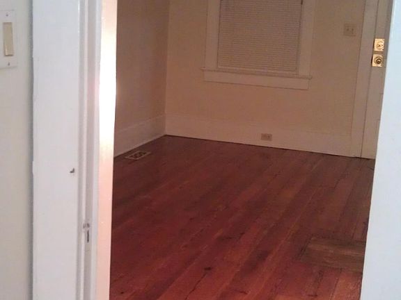 Looking towards front door and window, not full picture