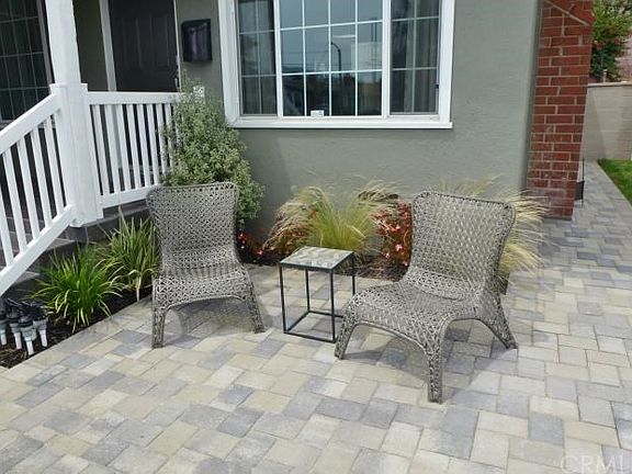 Great place to relax and watch the kids play in the vinyl fenced yard