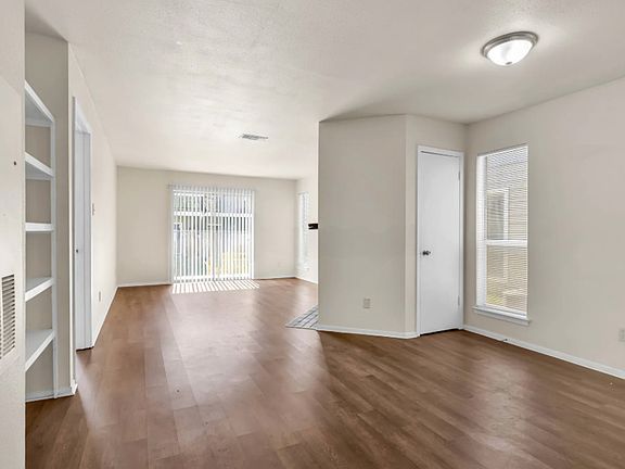 Dining/Living open space, practical coat closet/storage.