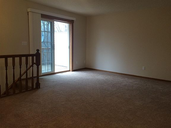 Living area with access to the patio