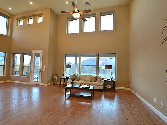 When you enter into your New KB Homes you will notice the Wow Factor right away.  The Dramatic Two Story Wall of Windows and more.