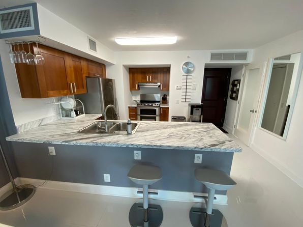9499 Collins Ave APT 206