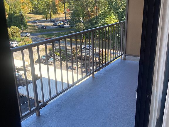 Large balcony (5' x 20') view at lunchtime on a sunny day