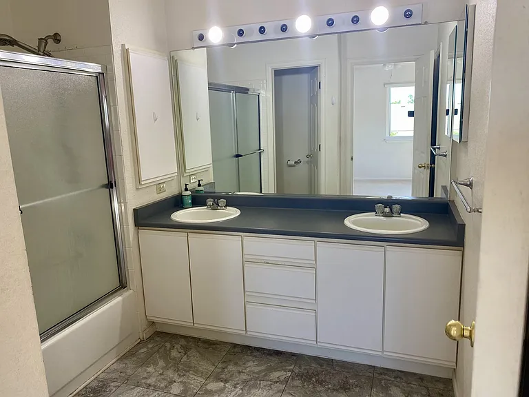 Private en suite bathroom with huge walk-in closet.