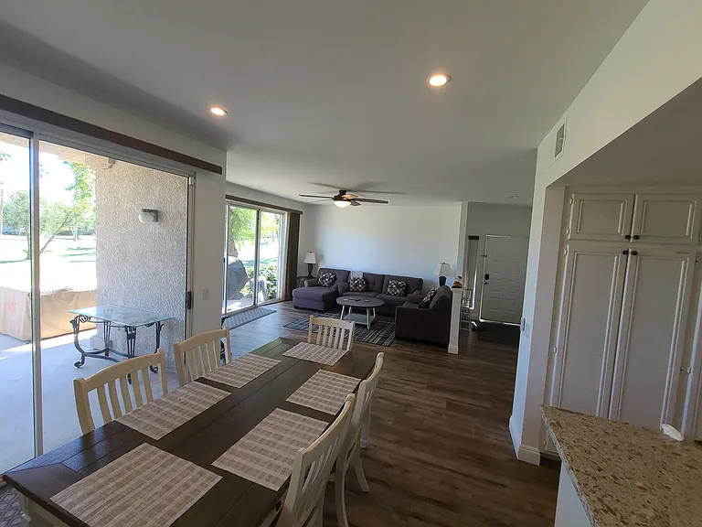 Spacious living room, dining area, and kitchen with stunning views_bringing the beauty of the outdoors into every corner of your home. ________