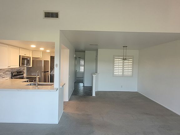 Living/Dinning/Kitchen Viewed From Front Patio Door