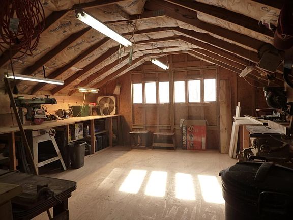 Don't miss dream workshop above the garage.
Take stairs from parking level up to shop