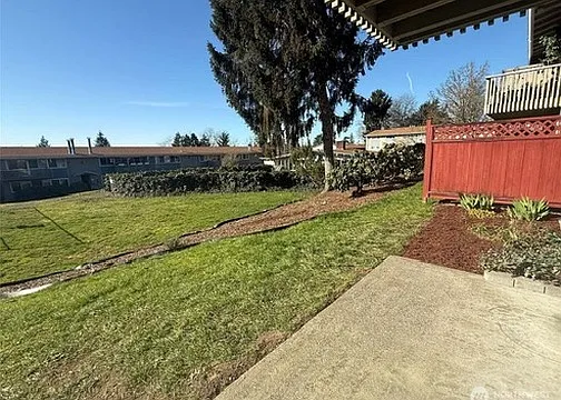 private end unit condo with covered patio