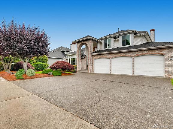 Generous parking and a 3 car garage