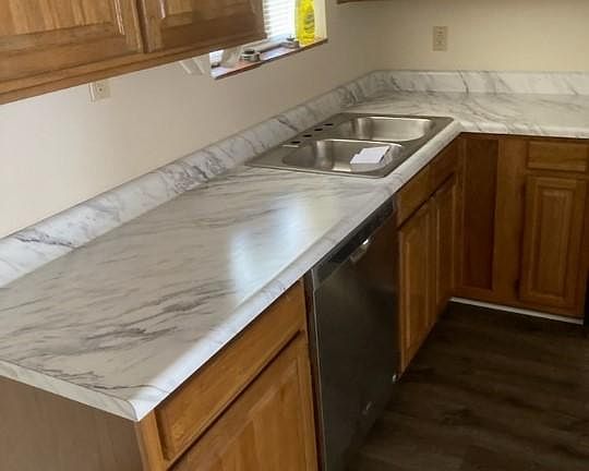 New counter tops with chrome sink fixtures
