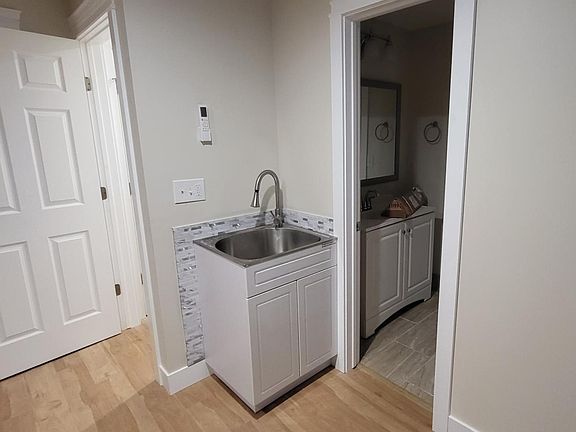 Sinkette with larger bathroom sink in your next door private bathroom
