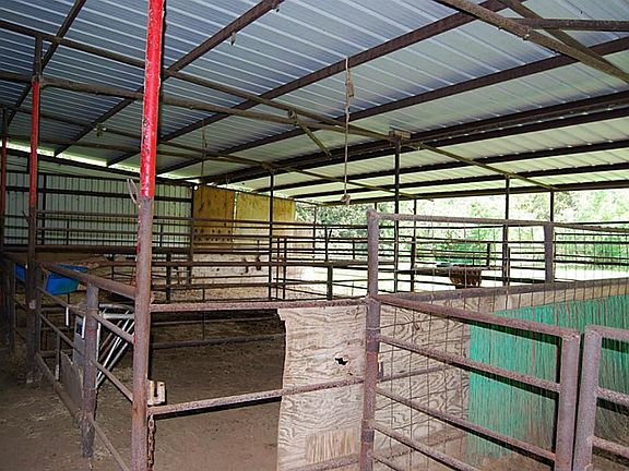 13 stalls in the newer barn with electric water