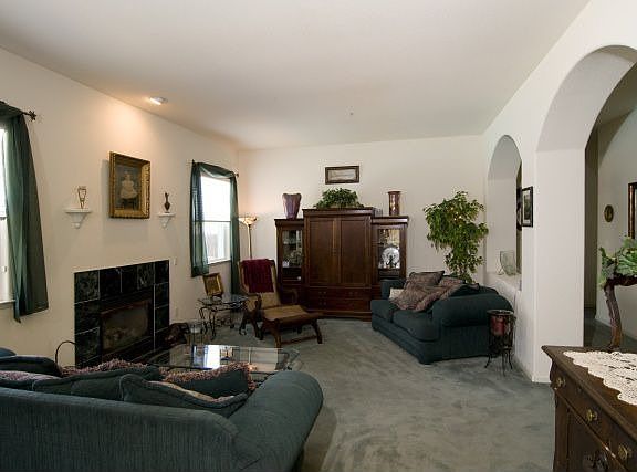 OPEN LIVING ROOM WITH ARCHWAY
