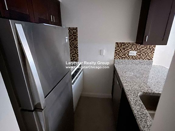 2nd image of 3710 N Pine Grove Ave APT 205