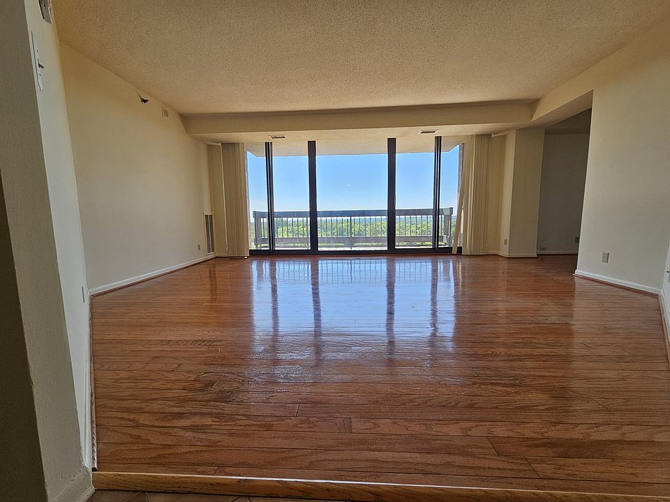 Living room overlooks the huge balcony