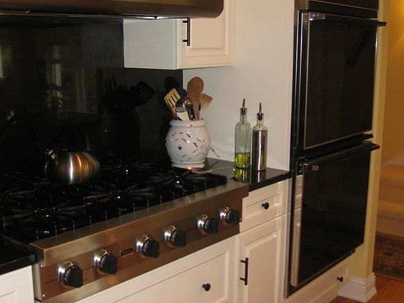 Viking 6 burner natural gas cooktop and double electric ovens.
