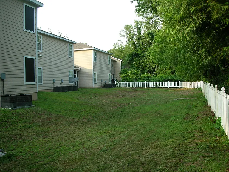 This is a picture of the common area in back of the townhome.