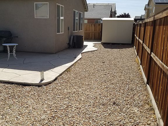 Backyard shed for additional storage if needed.
