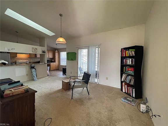 View of dining and kitchen from living room