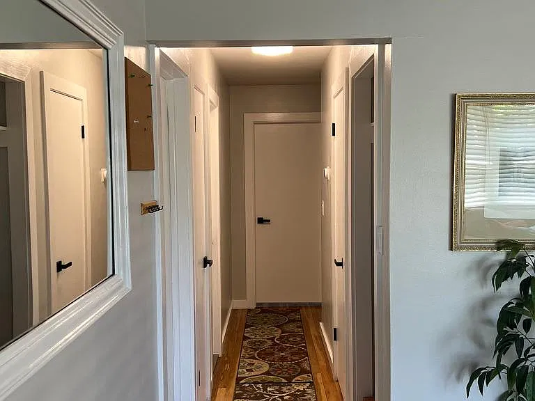 Hallway with updated doors