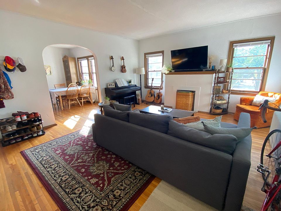 Front door of unit opens up to a large Livingroom, with ample room for desk/work area