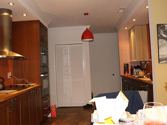 Kitchen view from dining area; open space.