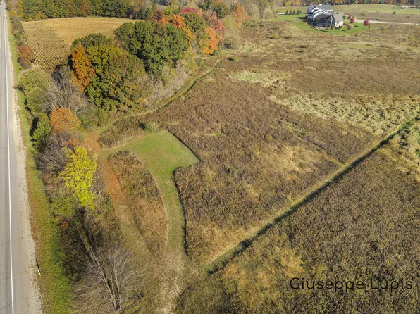 8655 Cannonsburg Rd NE, Ada, MI 49301