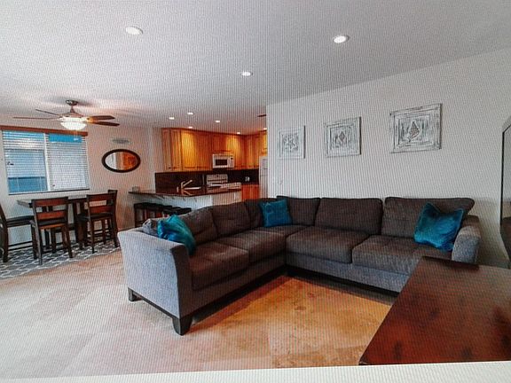 Large sofa with flat screen large TV