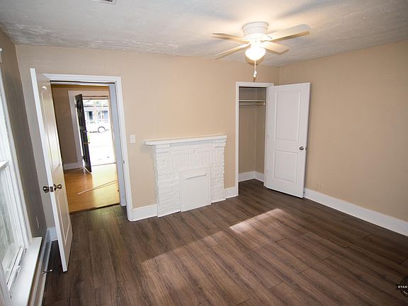 Bedroom 1. Closet on right and door to living room on left.