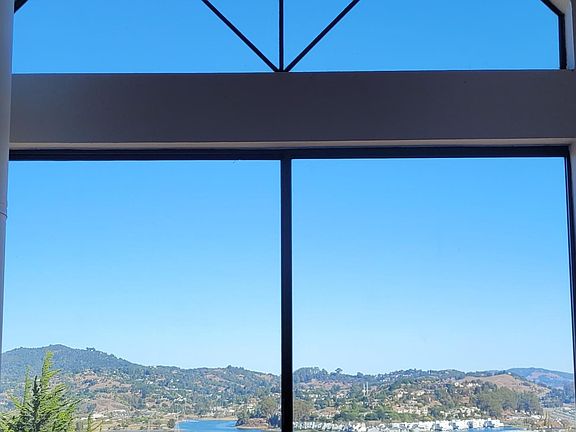 The view from the master bedroom on a clear sunny day (low tide in the Bay).