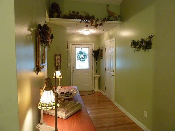 Foyer, living room and dining room have hardwood flooring 