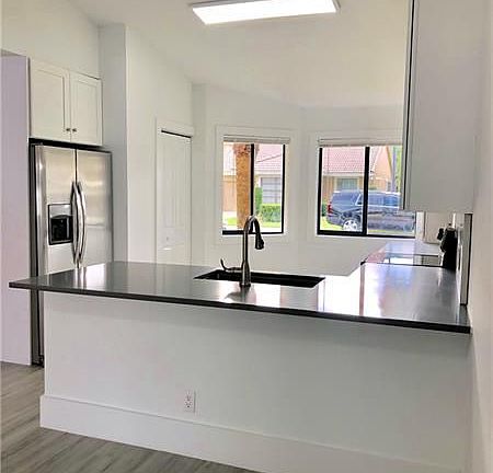 5th image of 9941 61st Way S