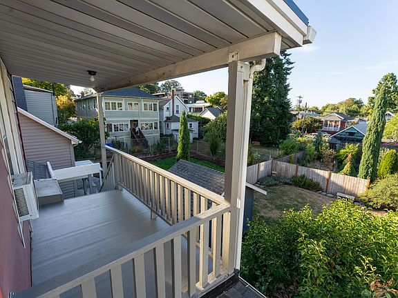 Private covered balcony off kitchen.