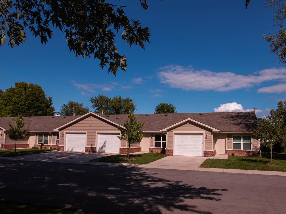 Front exterior pic of our 1 bedroom condo with attached garage and attached garage. End unit!