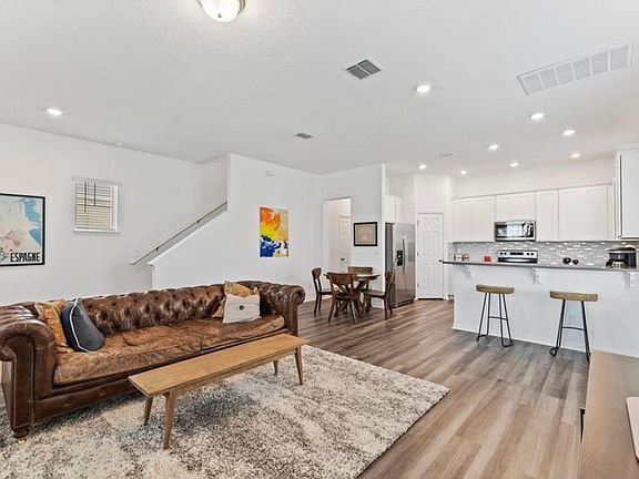Living room and kitchen. Plenty of room for dining table