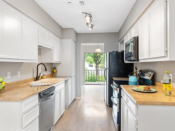 3rd image of 5708 Meadow Wood Ln