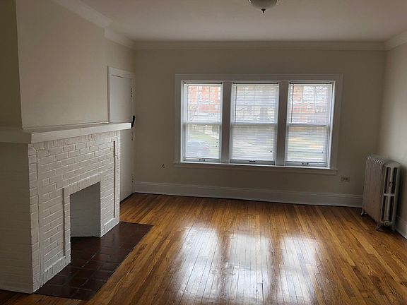 Hardwood Floors, Decorative Fireplace, Vintage Moulding