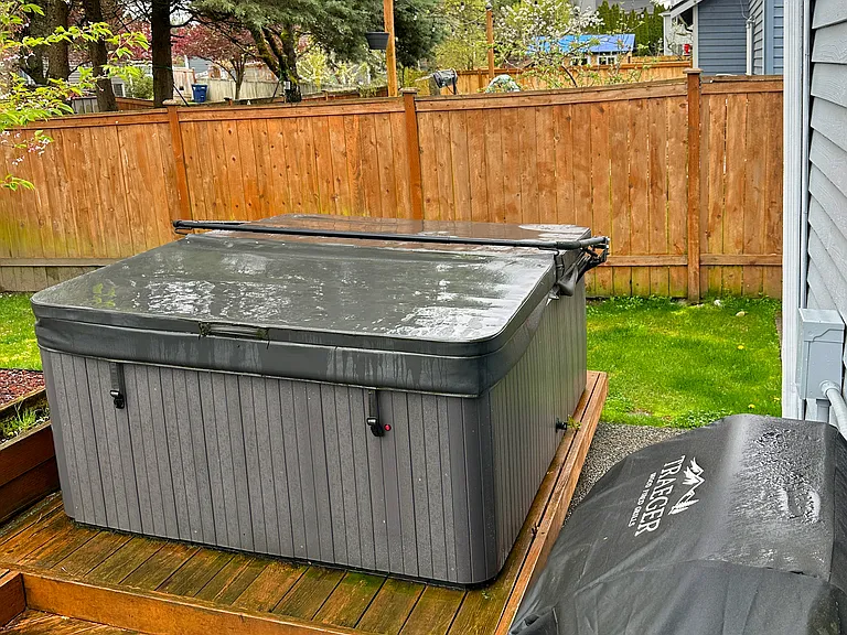 Hot tub and Trager grill