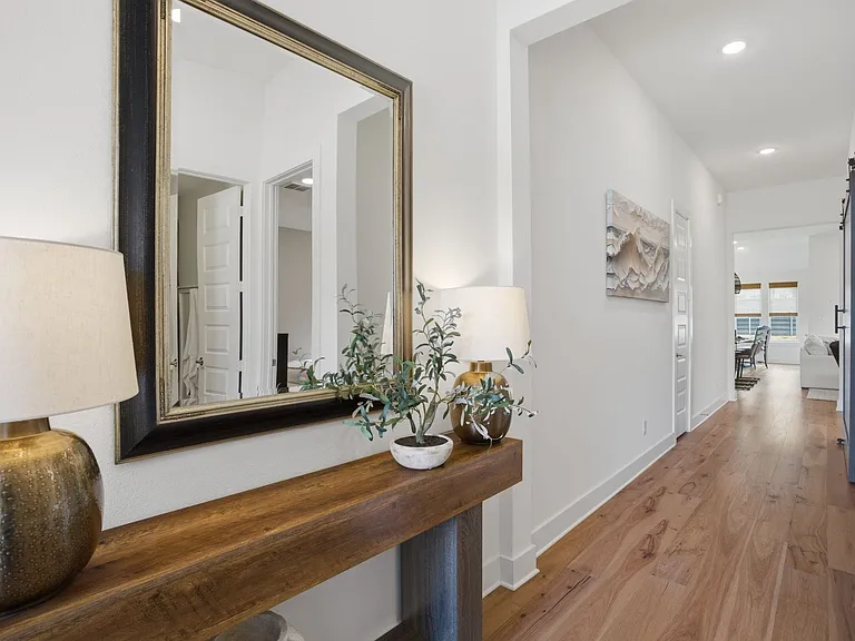 From the moment you enter, you'll see the extensive, easy to care for luxury vinyl plank floors that span from the front to the back.
